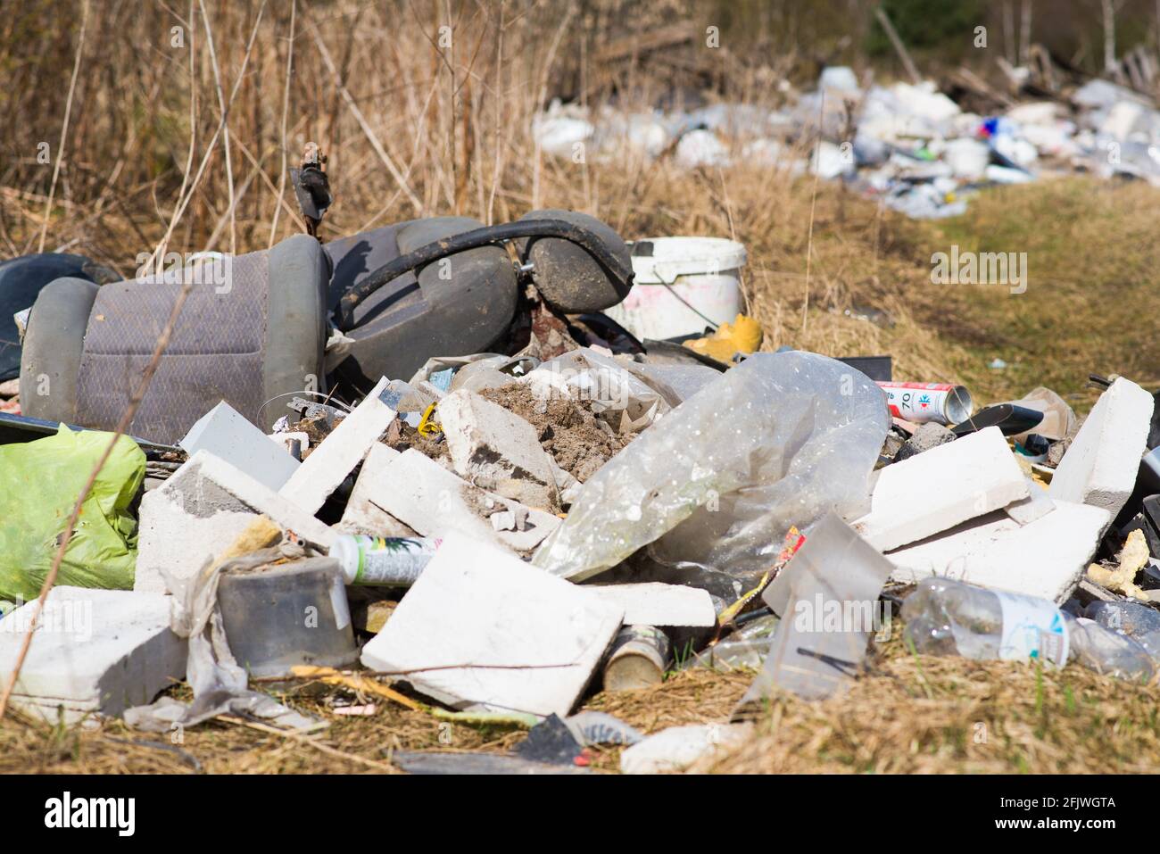 Garbage dump in a woods, forest. Ecological problems Stock Photo - Alamy