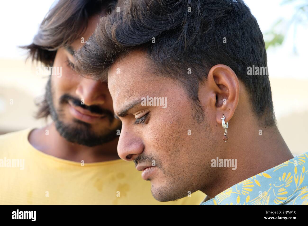 Portrait of two young Indian males in the park Stock Photo