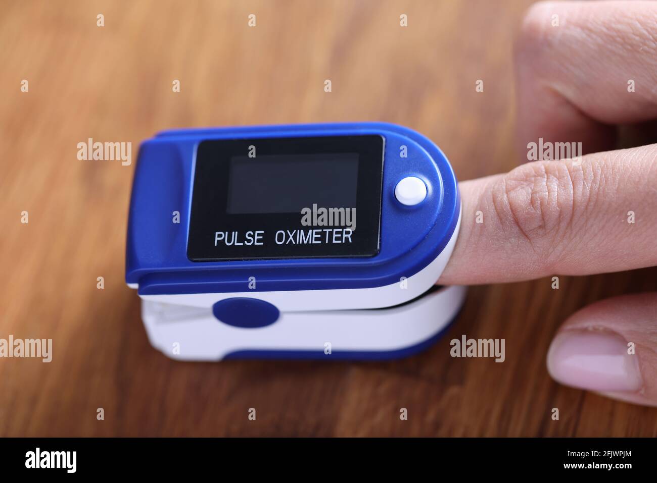 Heart rate monitor is fixed on the finger Stock Photo Alamy