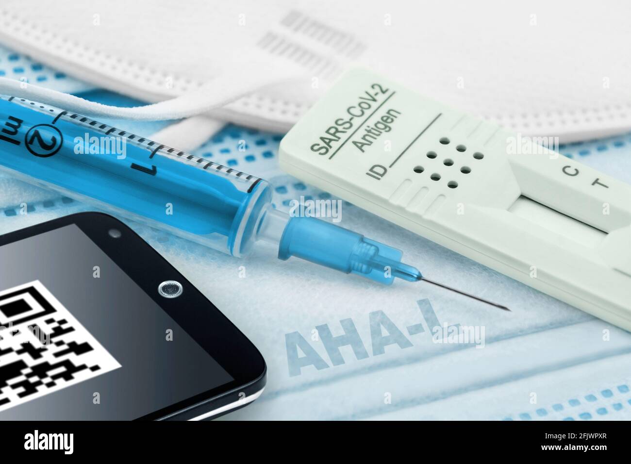 Concept Corona Antigen Rapid Test and  Mask with Vaccination and Mobile Stock Photo