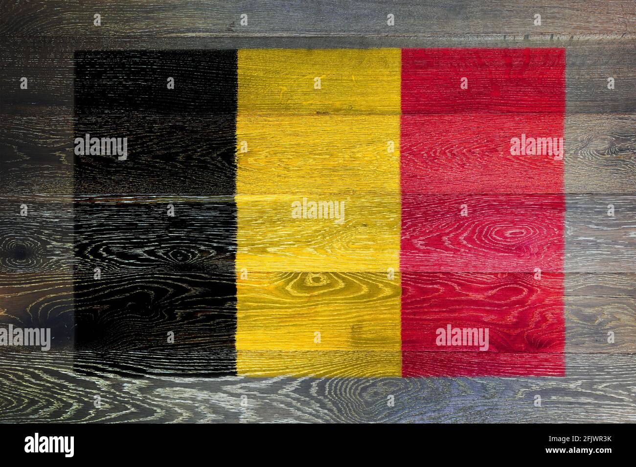 Belgium flag on rustic old wood surface background Stock Photo - Alamy