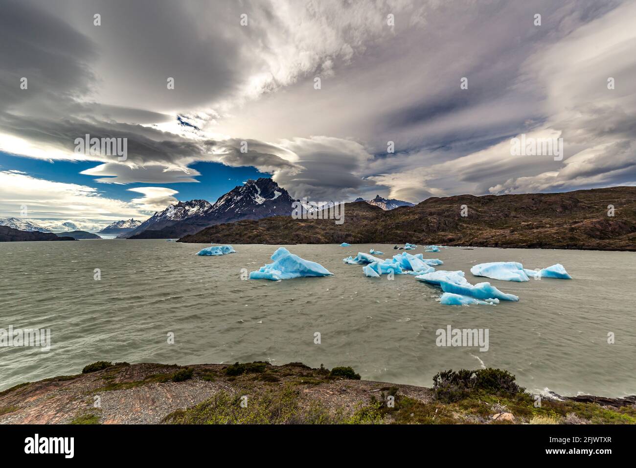 View of glacier at Lake grey and Isla de Los Hielos, Torres del Paine National Park, in Chile, South America Stock Photo