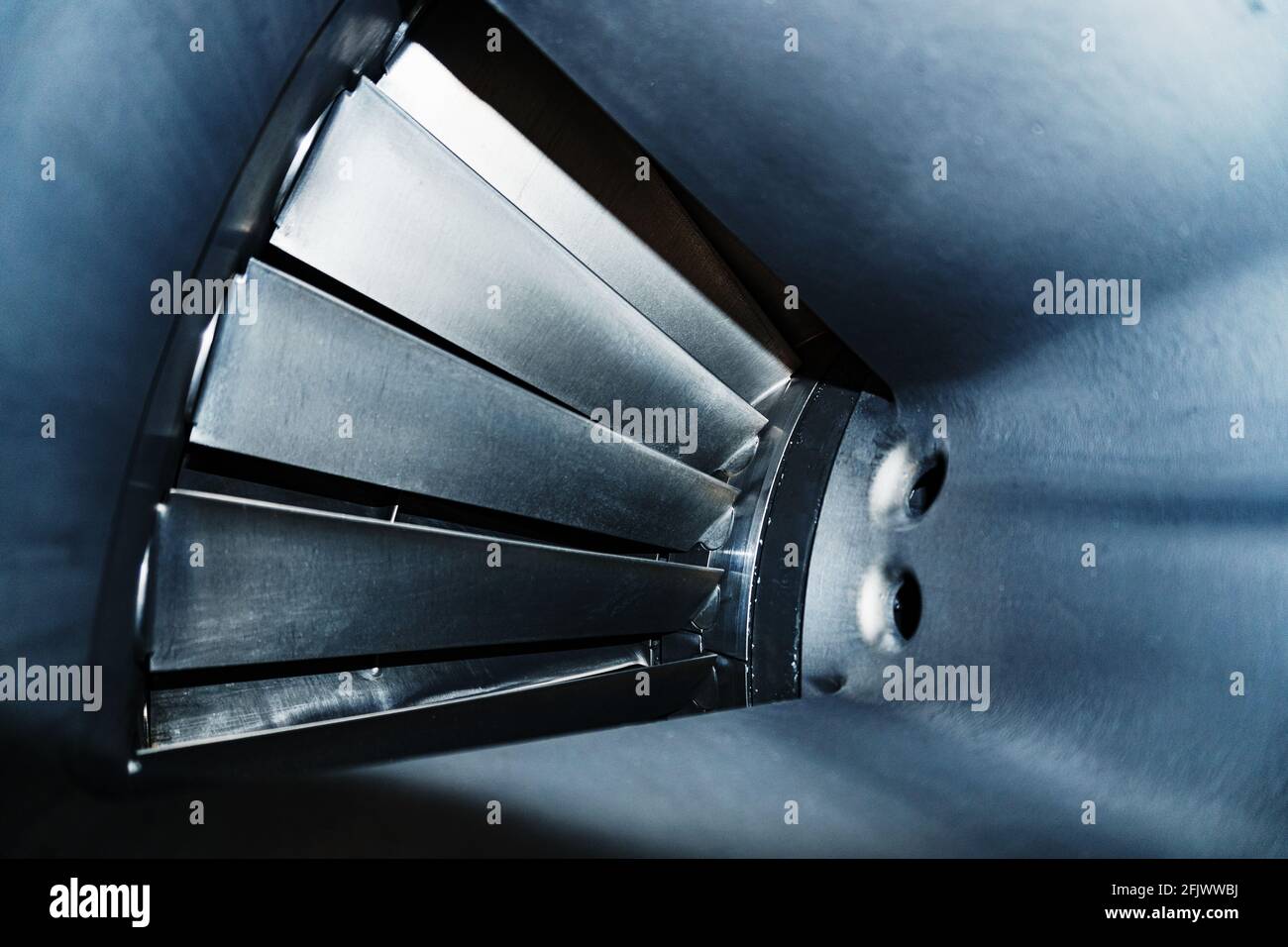 The blades and the flow part inside the gas turbine. Jet engine fan