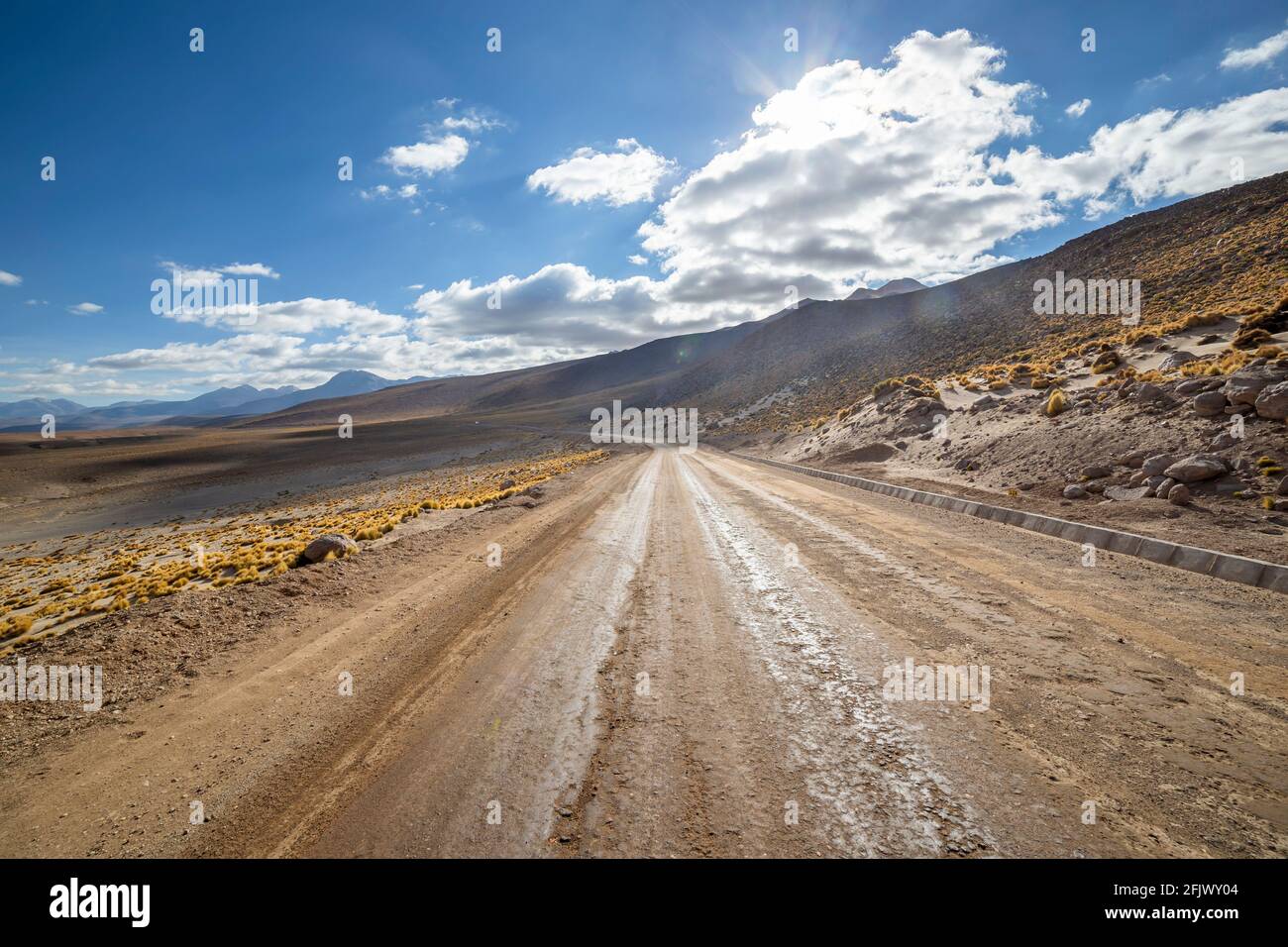 View from the Route B 245 at sunrise, a scenic road in the north of Chile. The road runs from San Pedro de Atacama to El Tatio Geysers, near the borde Stock Photo