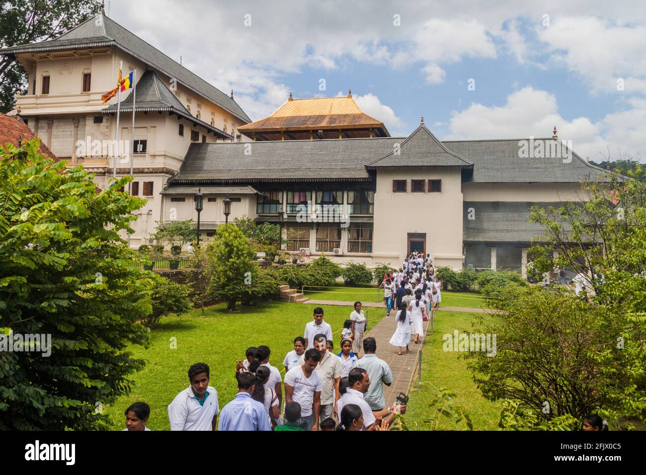 KANDY SRI LANKA JULY 19 2016 White Clothed Buddhist Devotees In kandy-sri-lanka-july-19-2016-white-clothed-buddhist-devotees-in