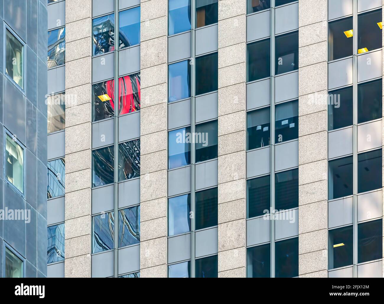 Glass and stone grid in Midtown Manhattan. Stock Photo