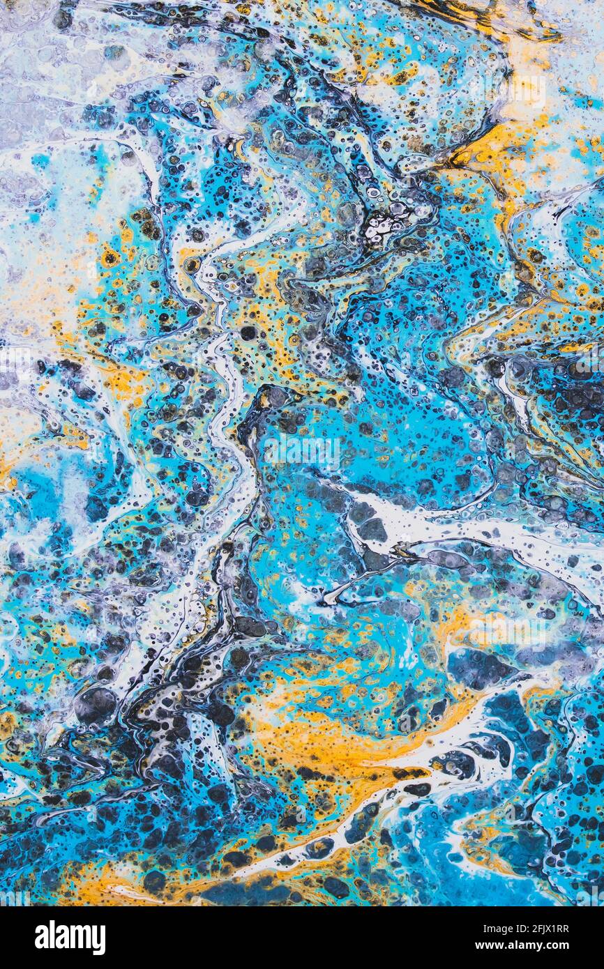Liquid marble, fluid art, stained background, blue alcohol ink, creative wallpaper with paint spots. Texture modern painting. Sea waves effect, water Stock Photo