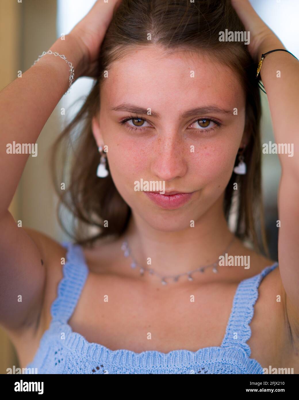 Closeup Portraits of a Dark Blonde Young Woman Stock Photo