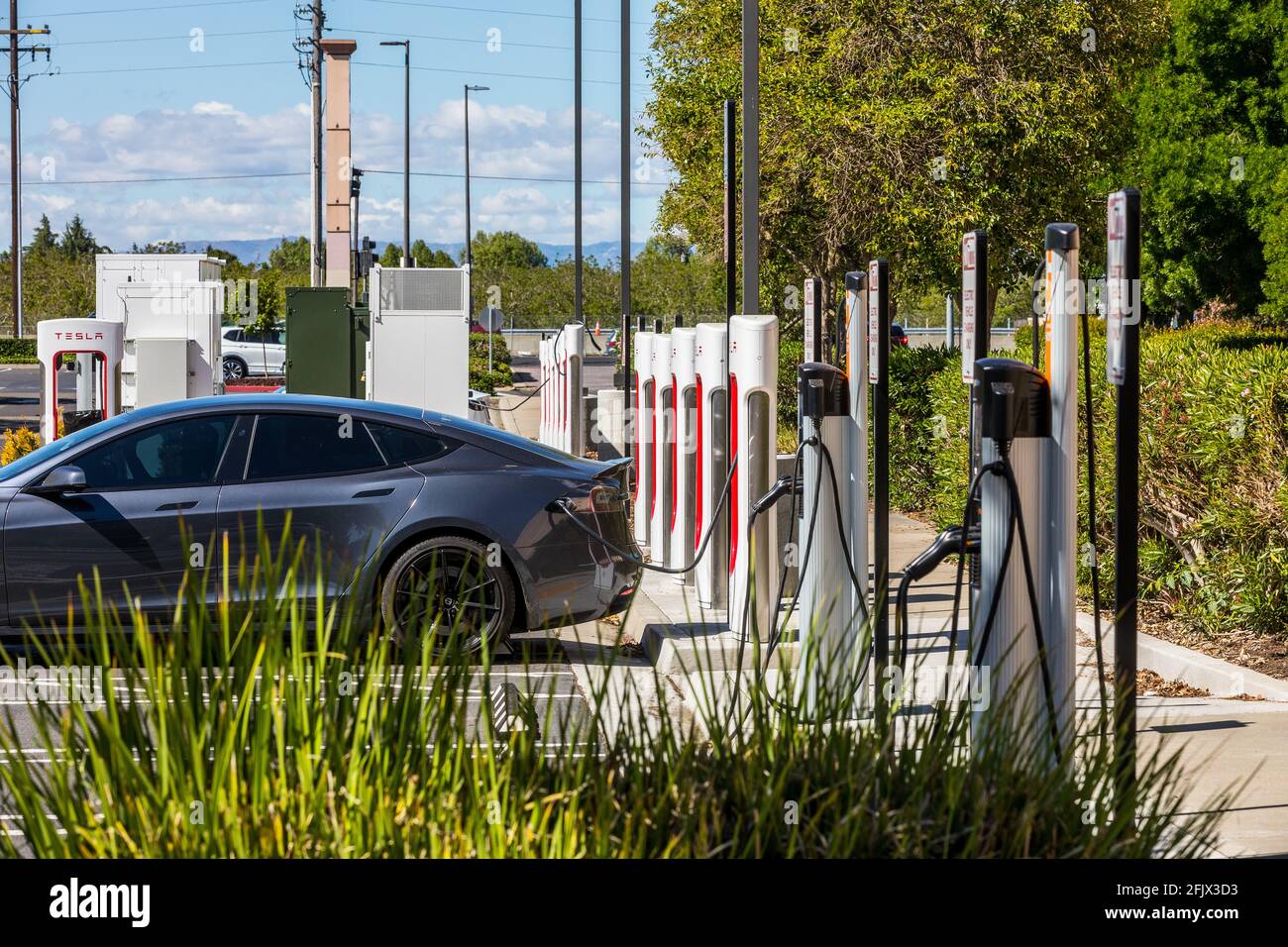 The Chargepoint Tesla Electric vehicle charging station at the