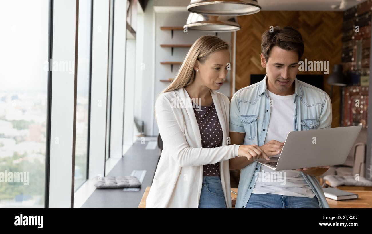 Diverse team engaged in brainstorming hi-res stock photography and ...