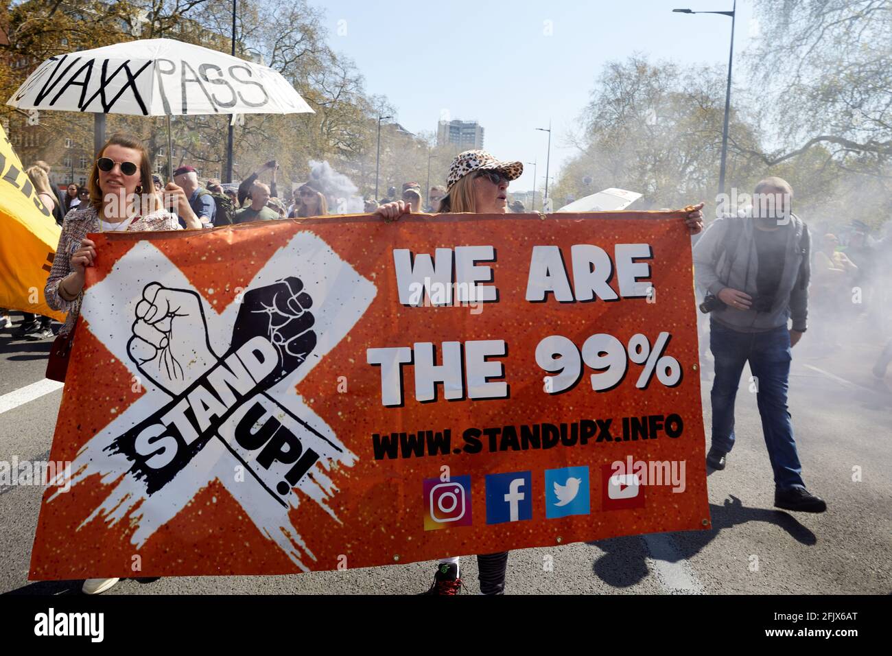 London, UK - 24 Apr 2021: Protestors marching in central London calling for a lifting of all coronavirus restrictions. Stock Photo