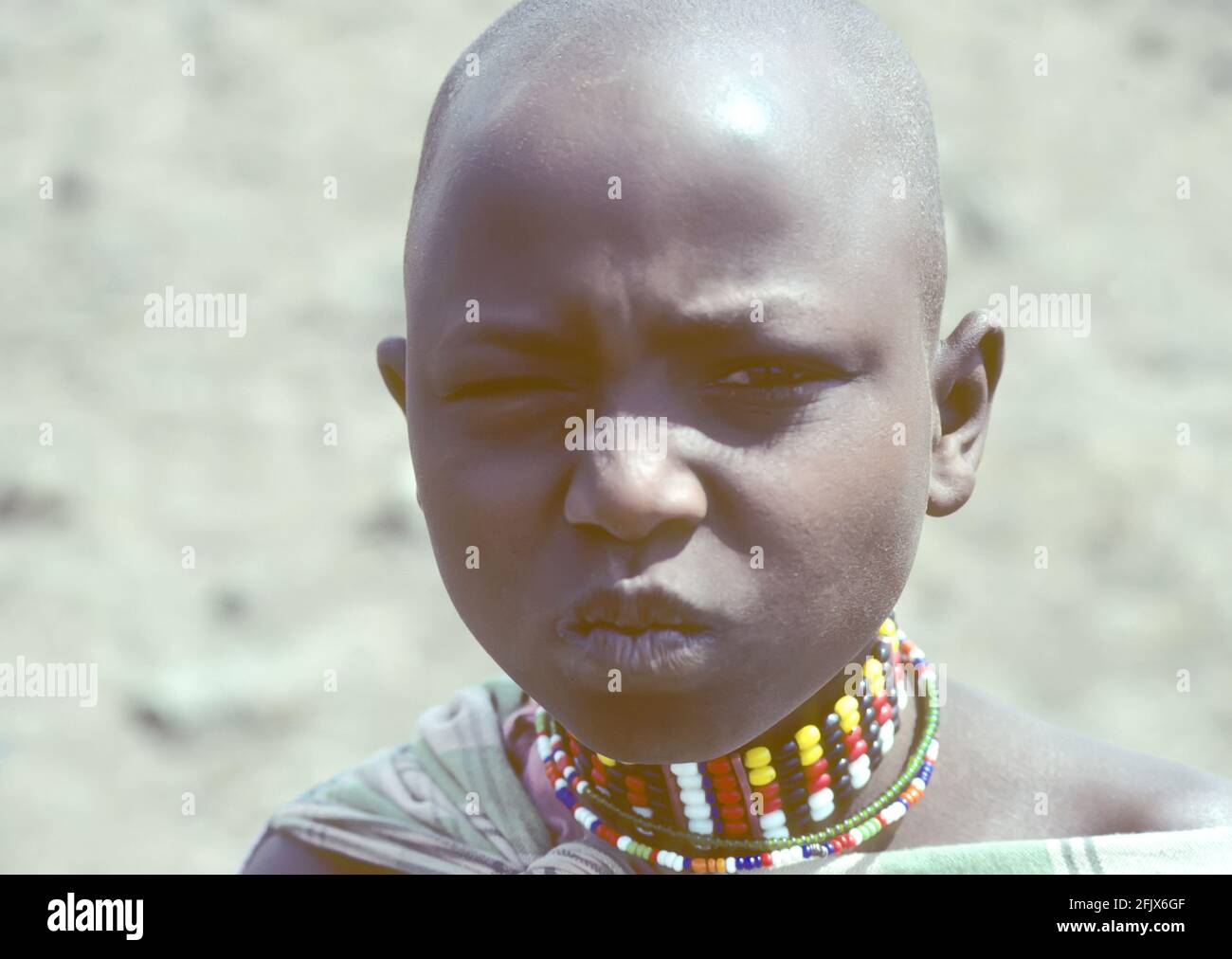 Masaai girl scowling Stock Photo