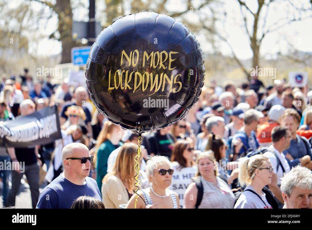London, UK - 24 Apr 2021: Thousands of people marched in central London calling for a lifting of all coronavirus restrictions. Stock Photo