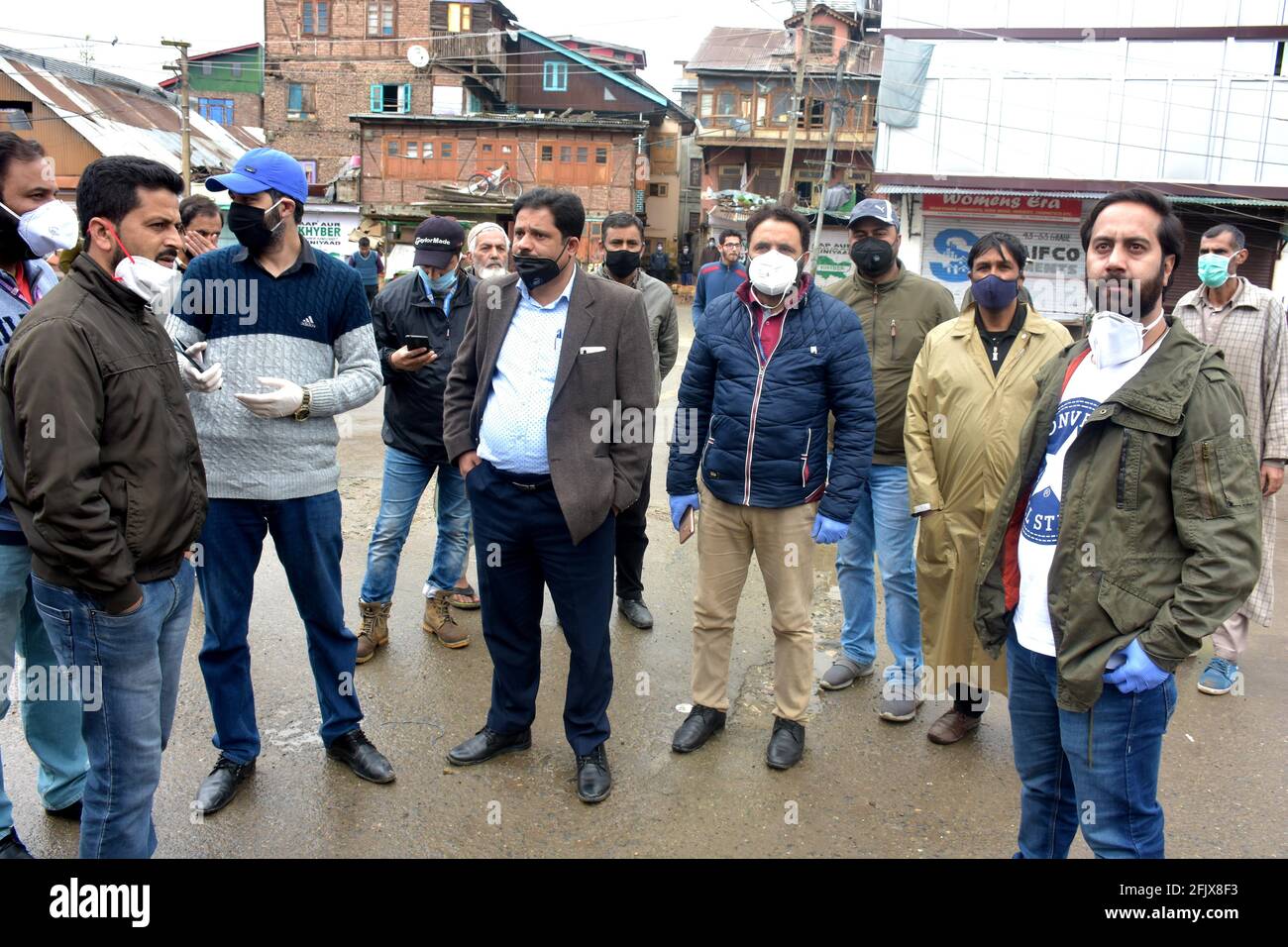 Srinagar, Jammu and kashmir India 07 August 2020. Fumigation of streets and houses by Kit wearing men warriors sanitizing and also parts of srinagar c Stock Photo