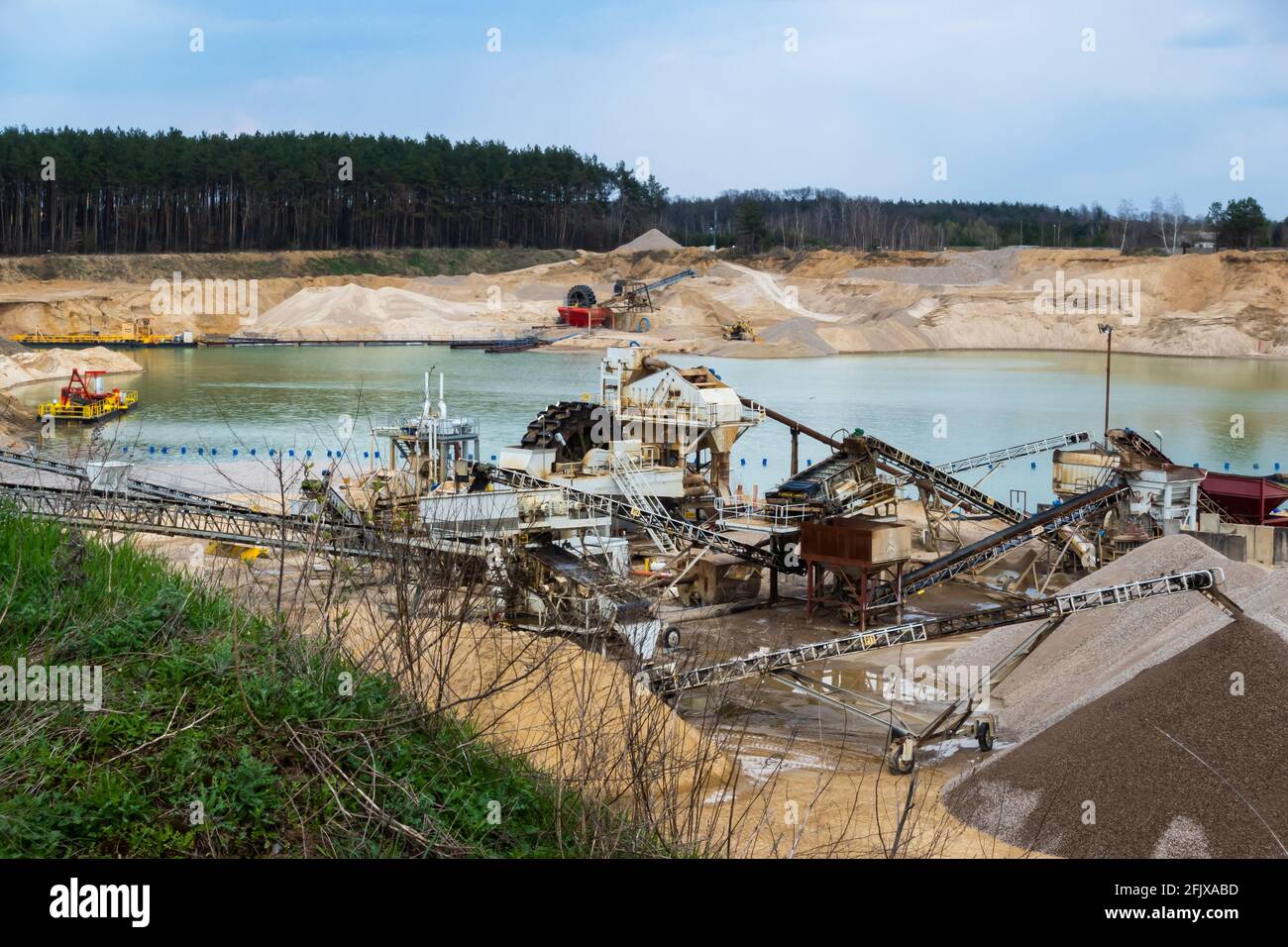 View of the production facility in the sand mine. Made on a sunny day. Stock Photo