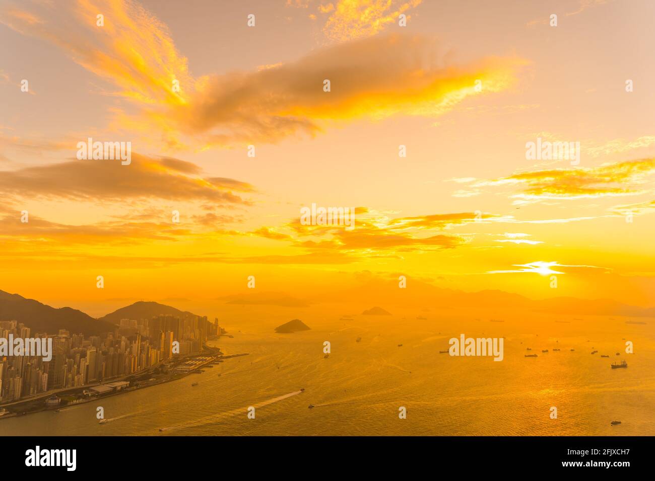 Beautiful colorful sunset in hong kong city skyline Stock Photo - Alamy