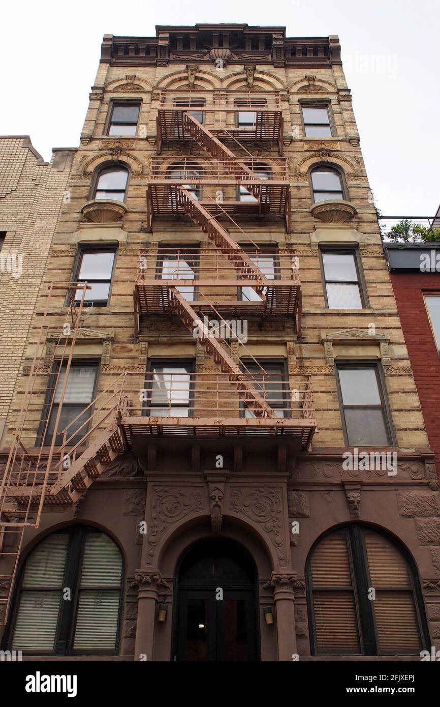 Facade of the late 19th-century multistory apartment building in the South Village neighborhood, at 15 Leroy Street, New York, NY, USA Stock Photo