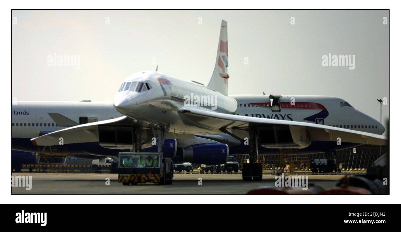 Concord that developed engine trouble towed in to hangar for inspectionpic David Sandison 15/7/2002 Stock Photo