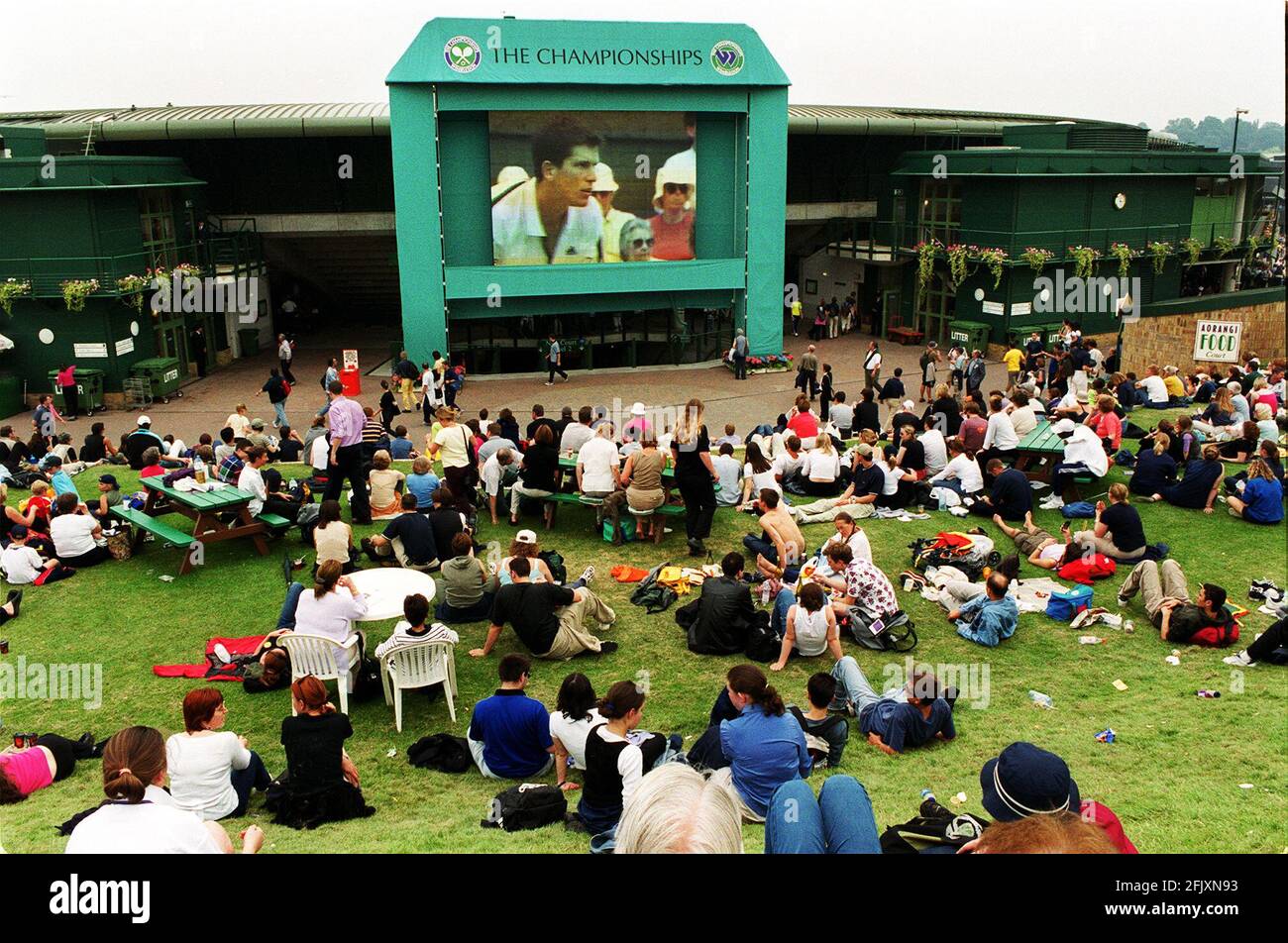 Wimbledon Crowd June 2000 watching tennis match on big screen Tim Henman playing Stock Photo