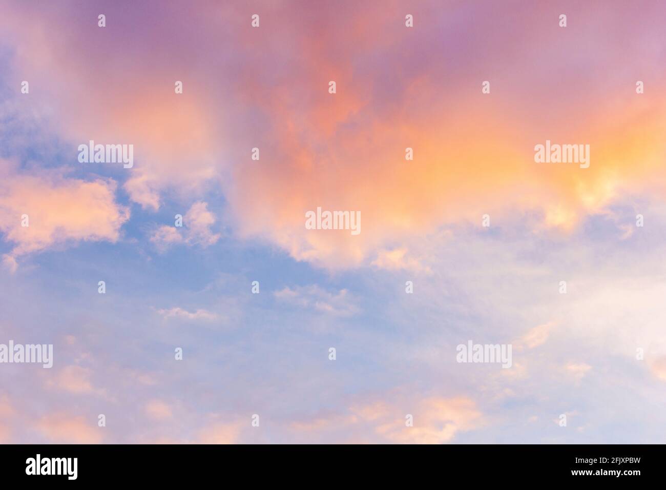 Sunset sky with floating clouds .beautiful cloud illuminated by the sun ...
