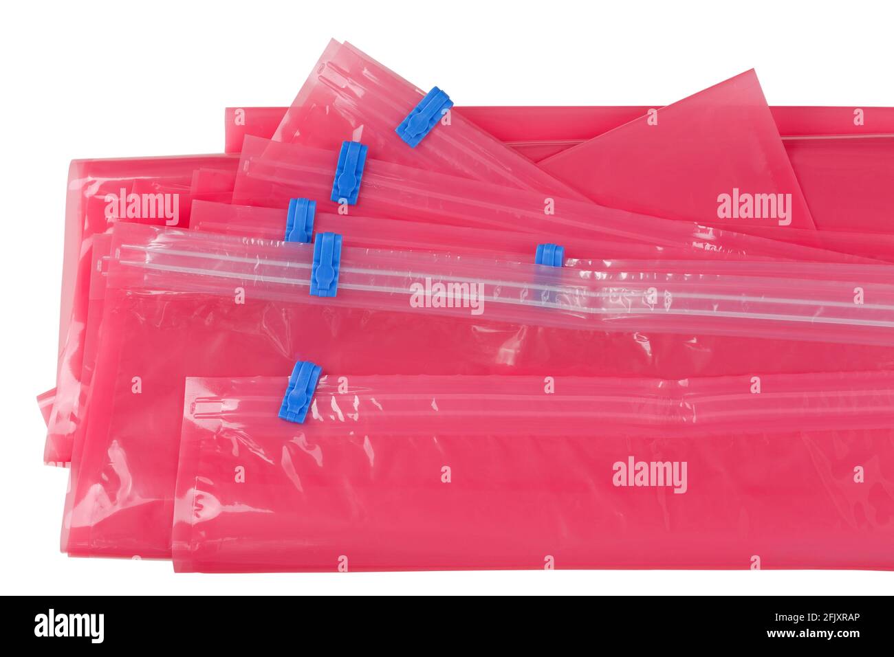 Closeup pink plastic zip lock bag with blue sealing to pack store cloths and resealable isolated on white background Stock Photo