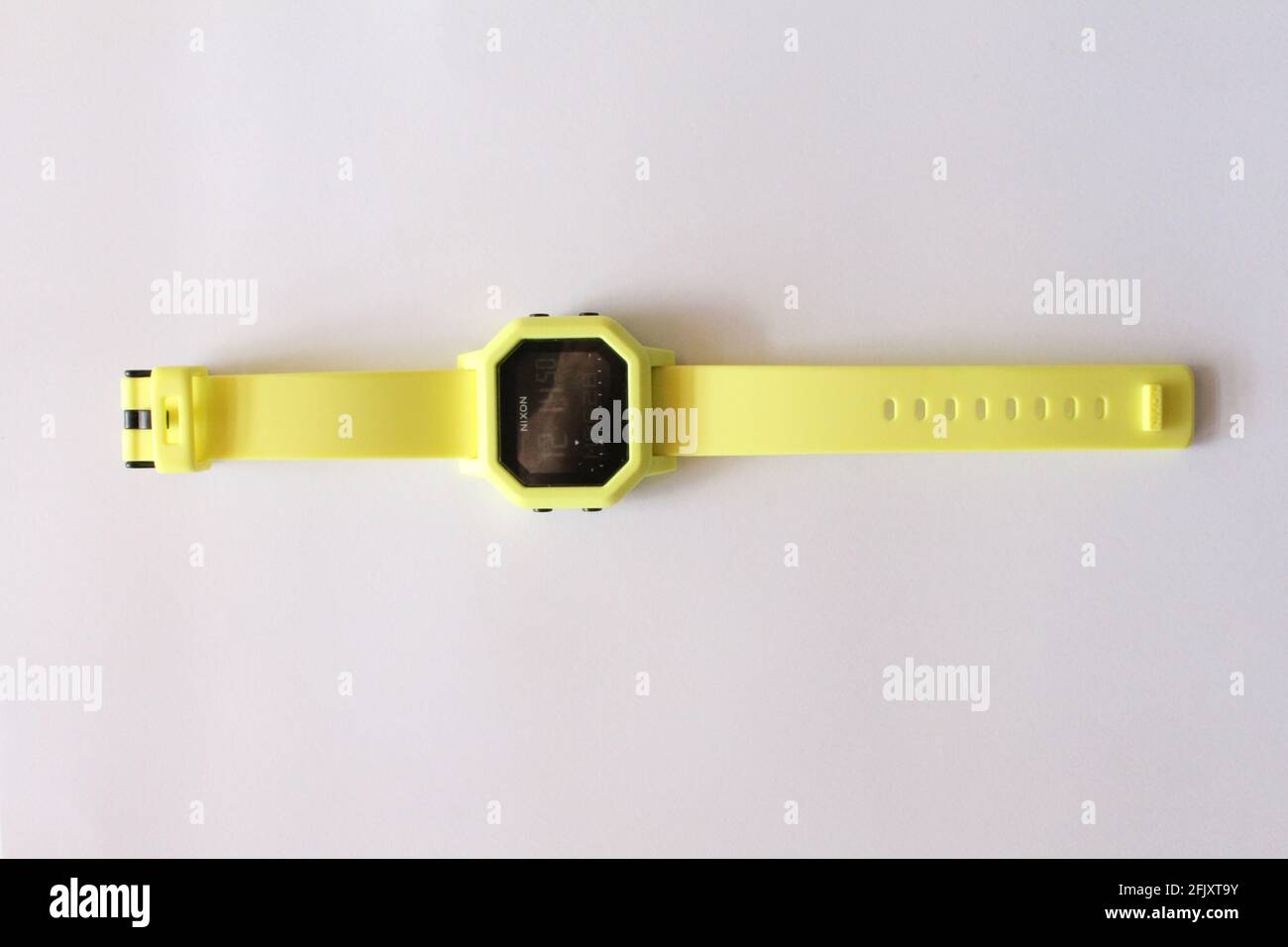 Nixon Neon Wrist Watch, Digital, on a white flat surface Stock Photo