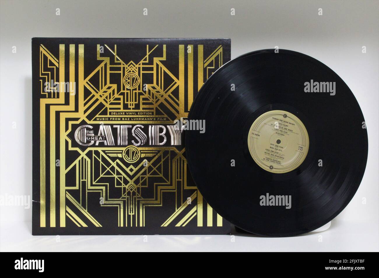 The Great Gatsby soundtrack on vinyl record LP disc from the movie soundtrack. Jazz music. The movie is based on the novel by F. Scott Fitzgerald. Stock Photo