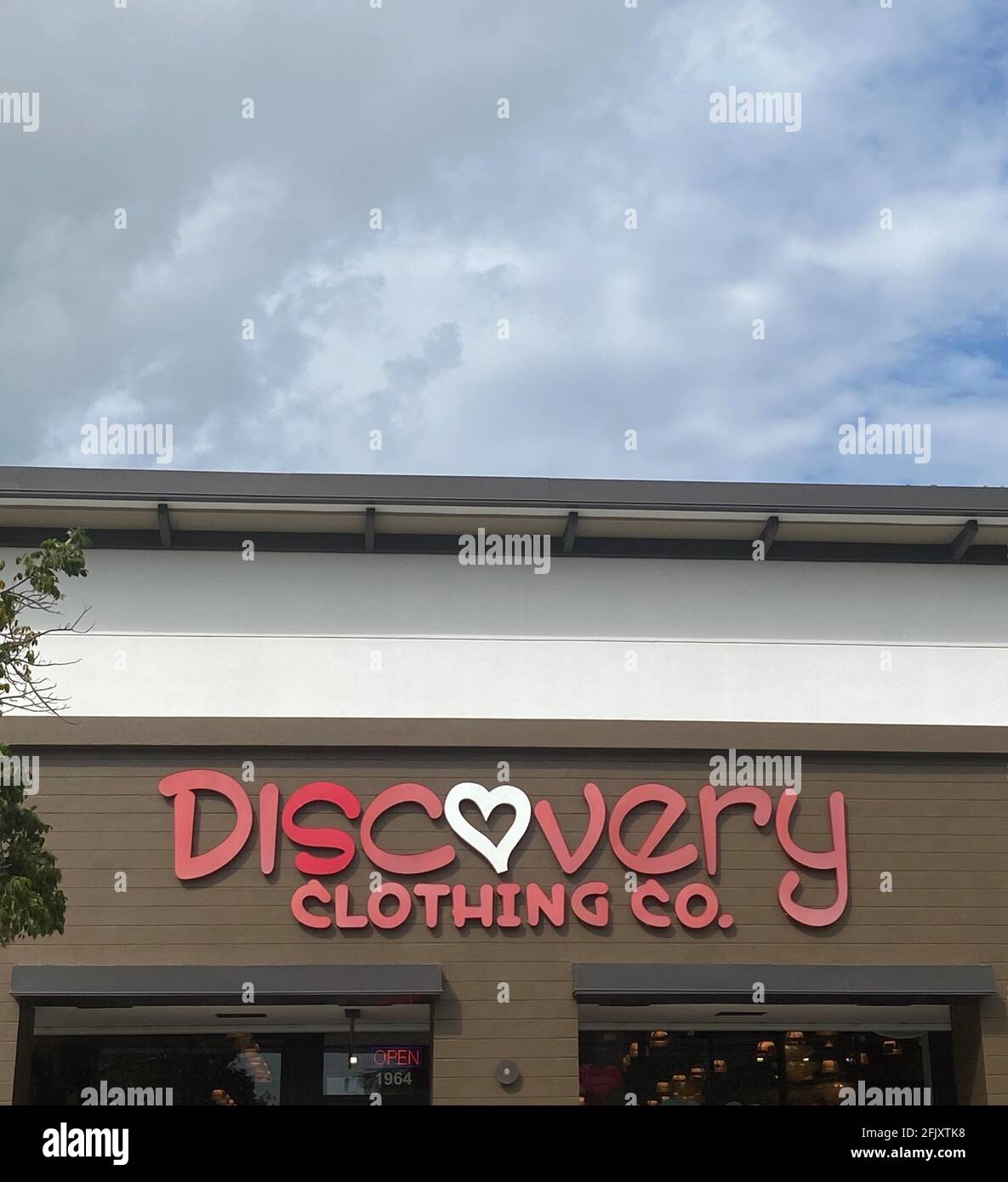 Exterior store front of Discovery Clothing Company entrance. Cheap and Cute Clothes for Women Stock Photo