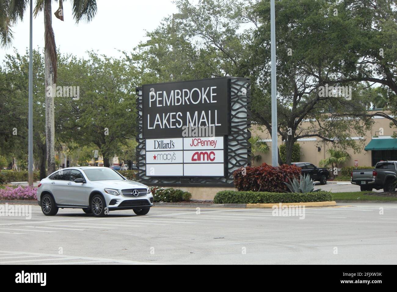 Pembroke Lakes Mall sign in Pembroke Pines Florida and a Mercedes Benz SUV car. Stock Photo