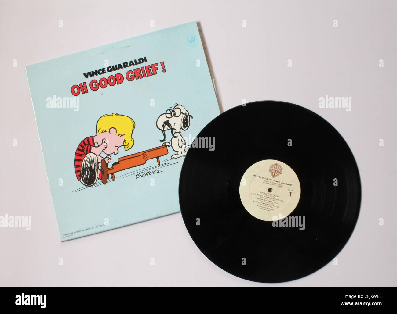 Peanuts songs composed by artist Vince Guaraldi music album on vinyl record LP disc. Titled: Oh Good Grief! Stock Photo