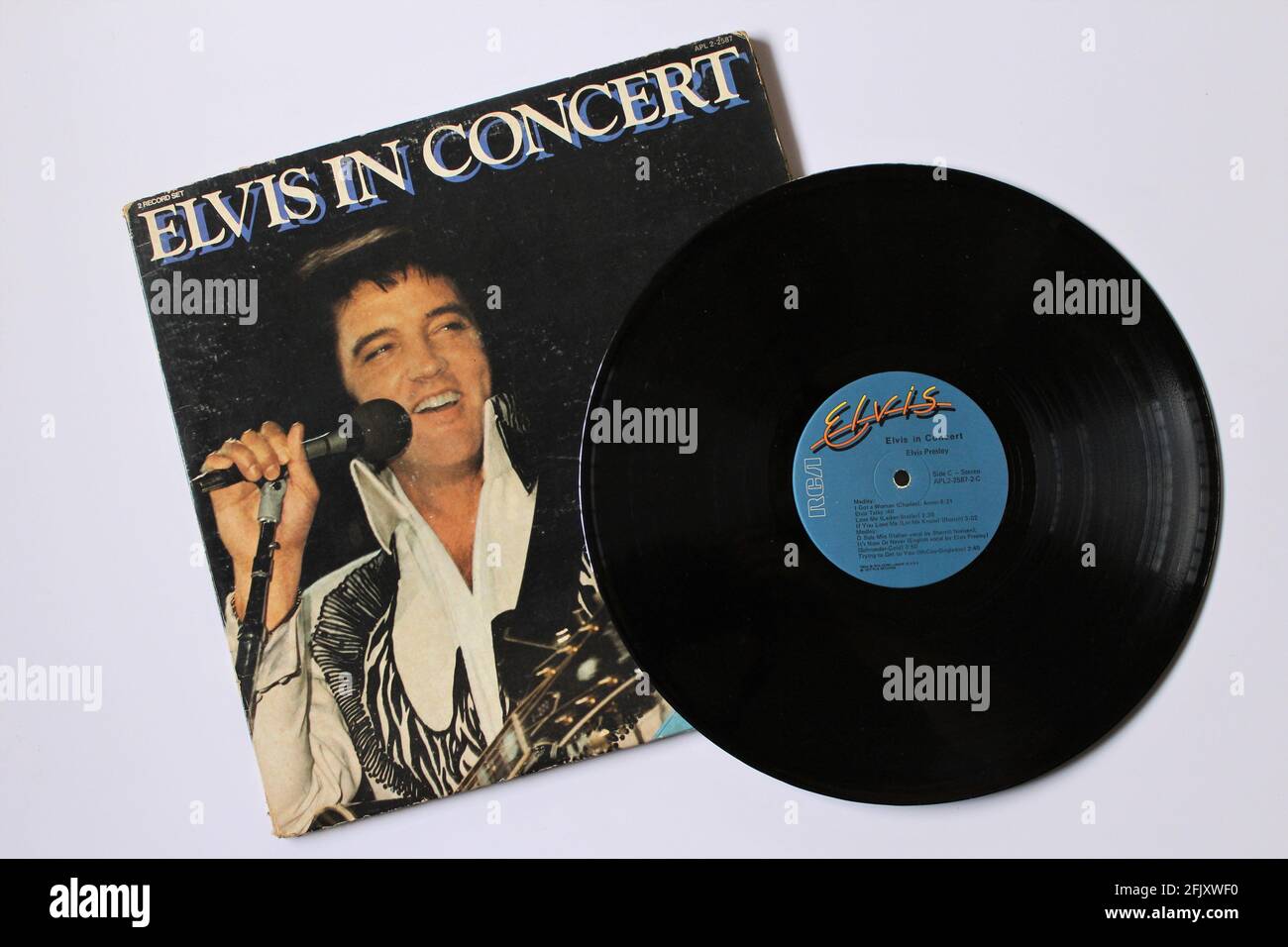 Rock and Gospel artist, Elvis Presley music album on vinyl record LP disc. Titled: Elvis in Concert Stock Photo