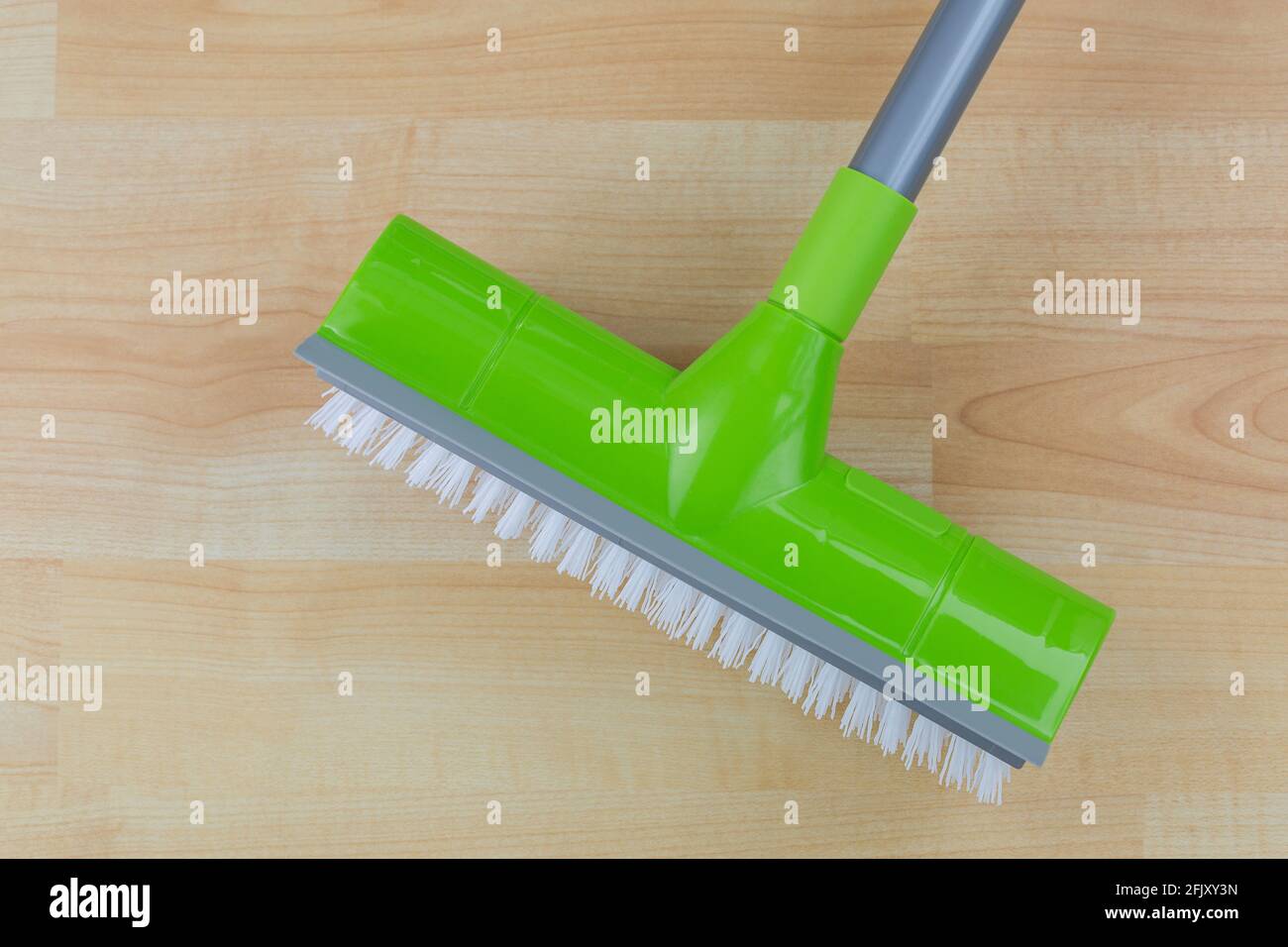 Floor cleaning hard Brush with dryer squeegee, sharp rubber edge for swipe cleaning Stock Photo