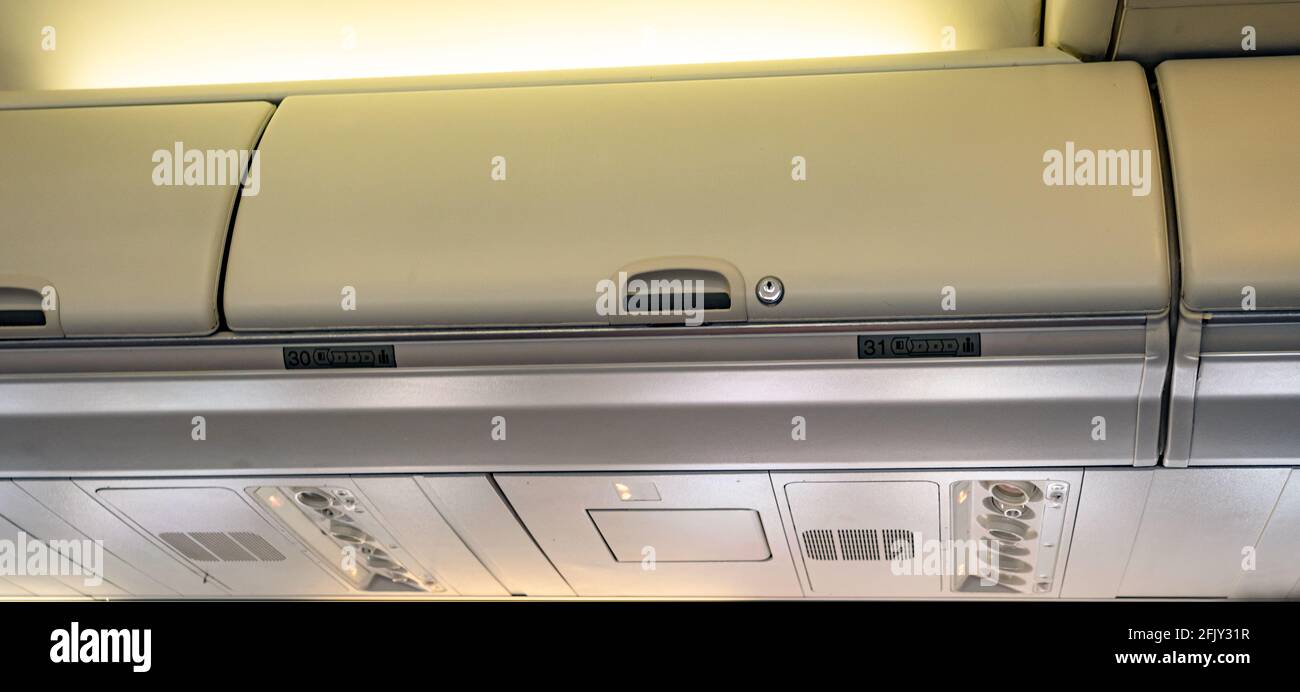 Overhead compartment luggage hires stock photography and images Alamy