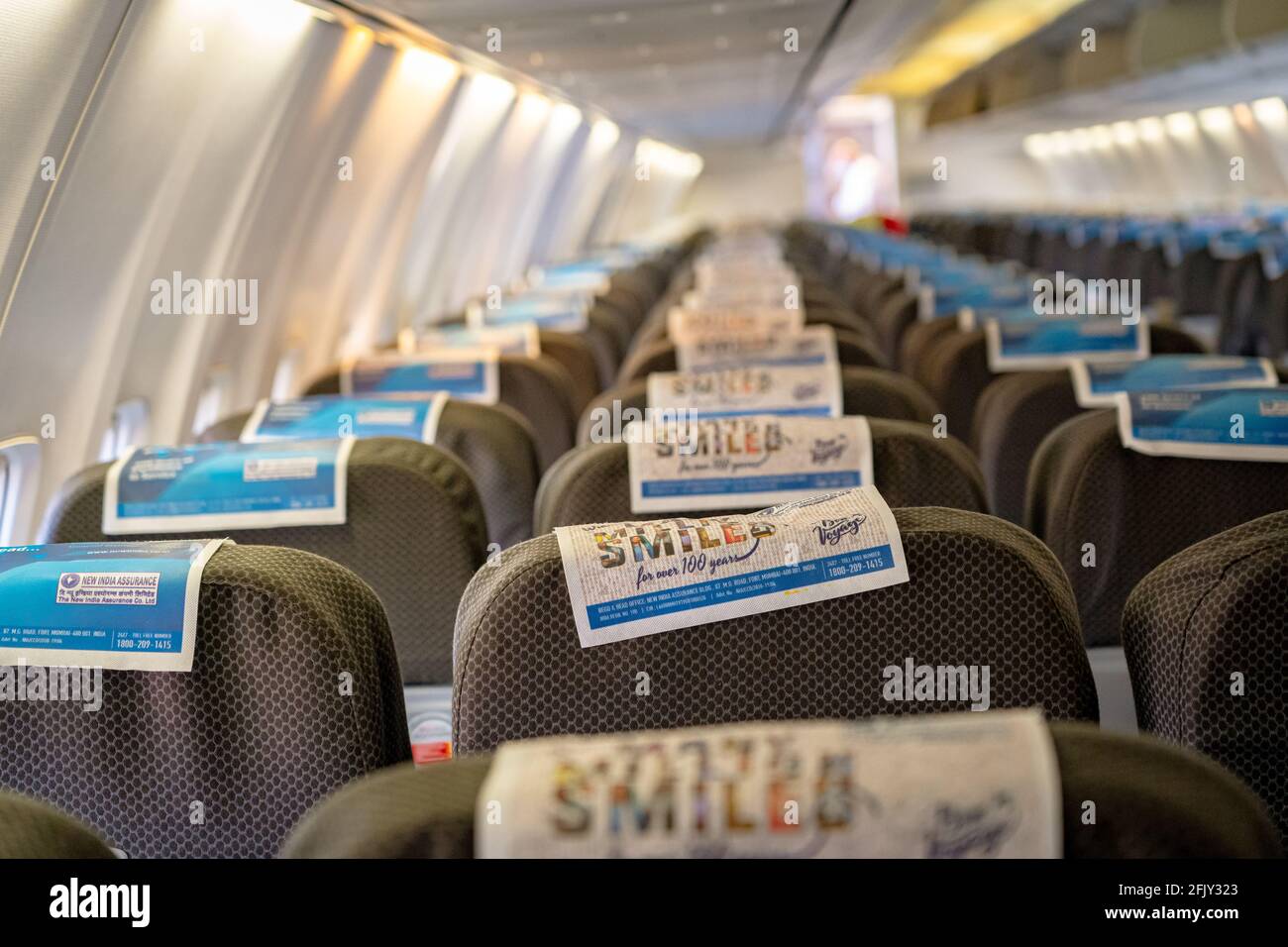 Selective focus of a fabric seat in an empty Spicejet aircraft cabin. Stock Photo