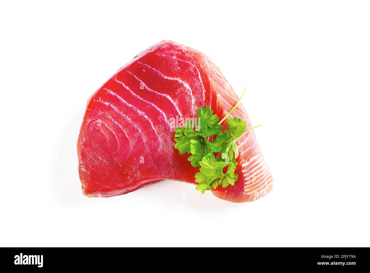 fresh yellowfin sliced tuna steak isolated on a white background. bluefin tuna medallions Stock Photo