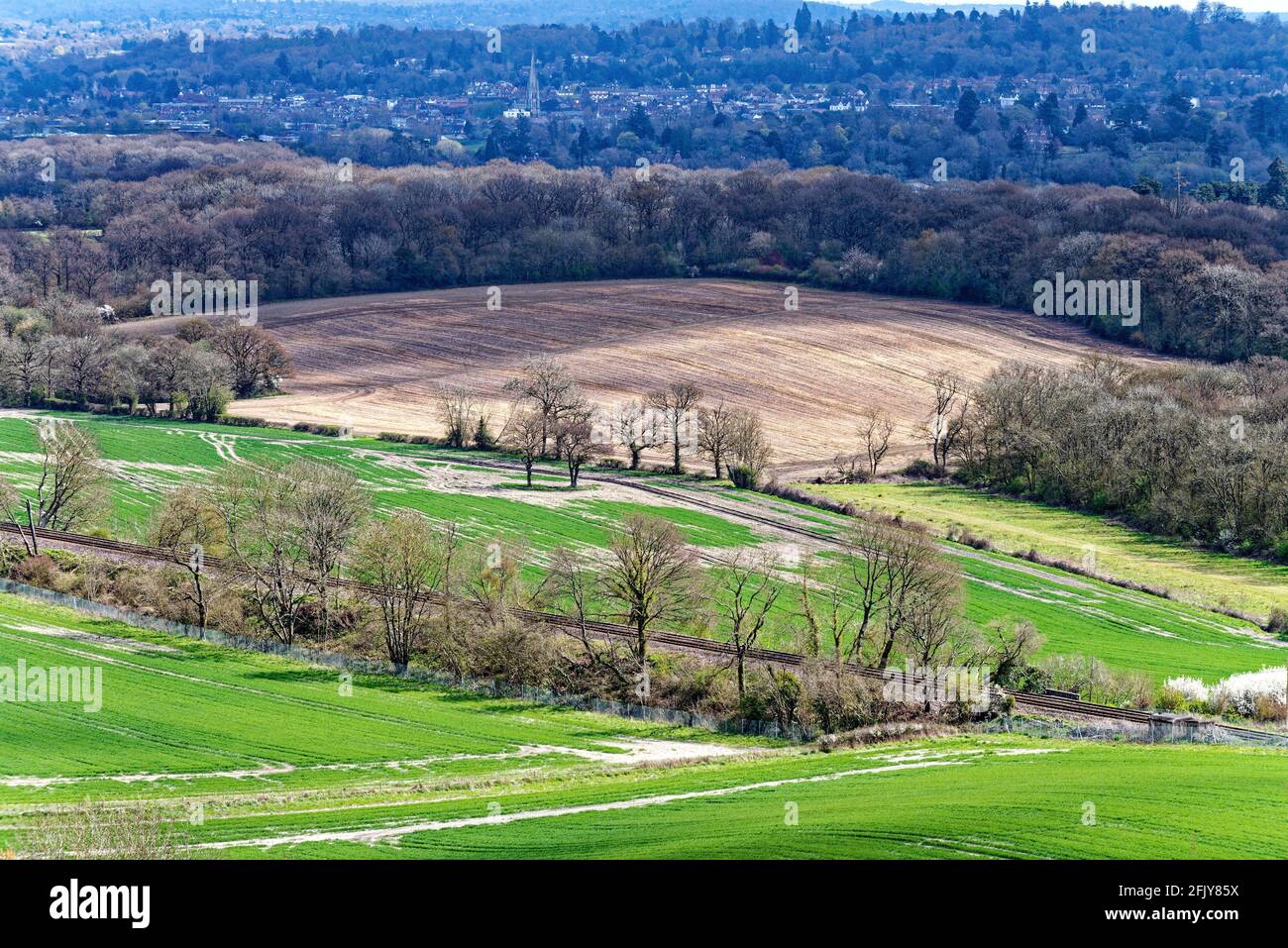 The elevated view looking south from White Downs in the Surrey Hills on a sunny spring day near Dorking Surrey England UK Stock Photo