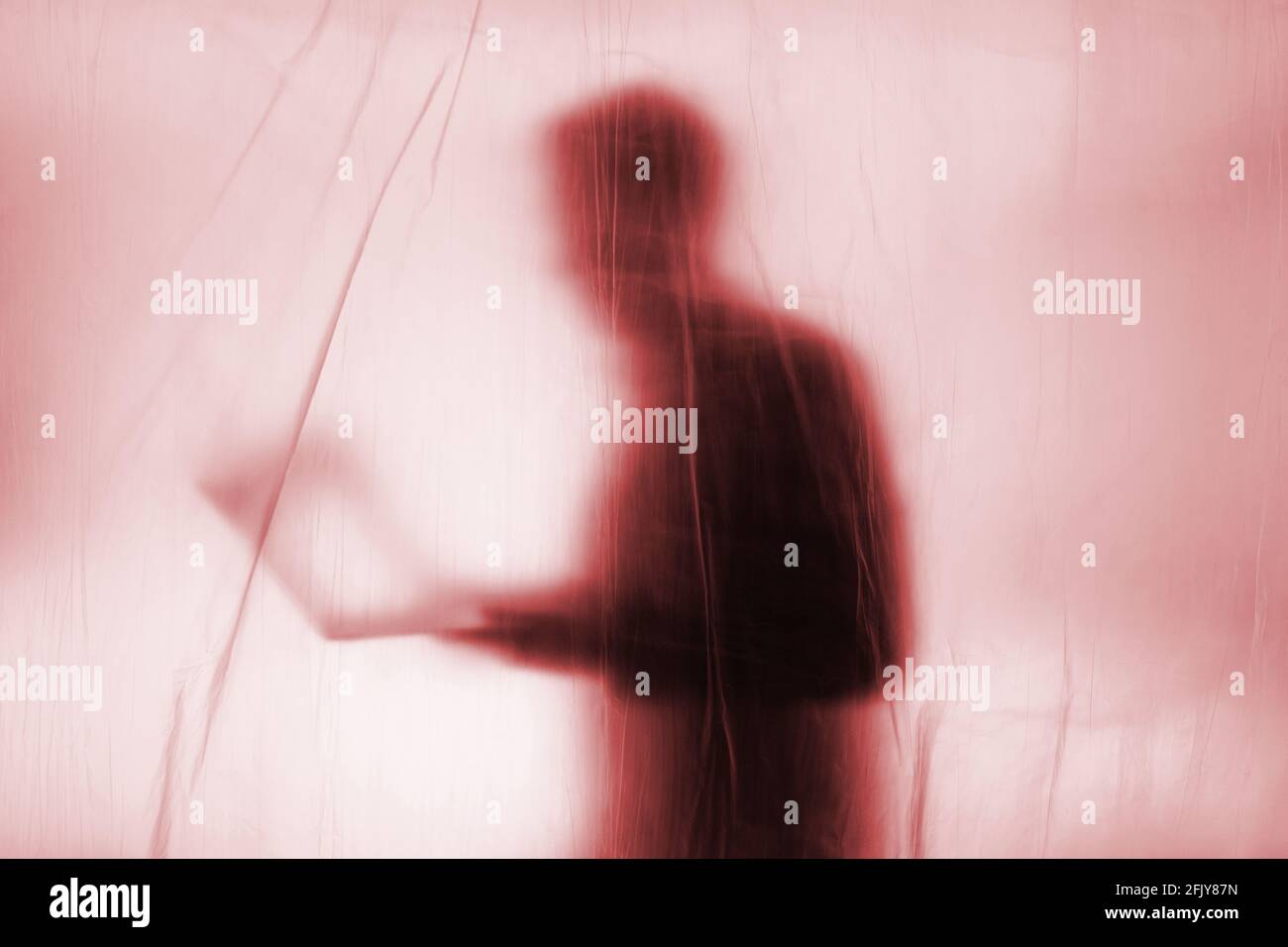 Anonymous Hacker commits cyber crime Stock Photo