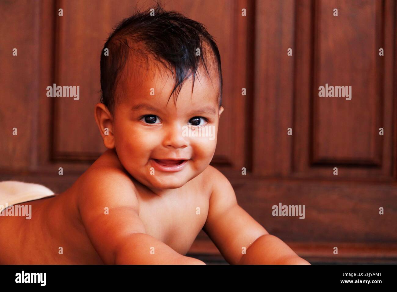 young indian baby boy looking with smily face Stock Photo - Alamy