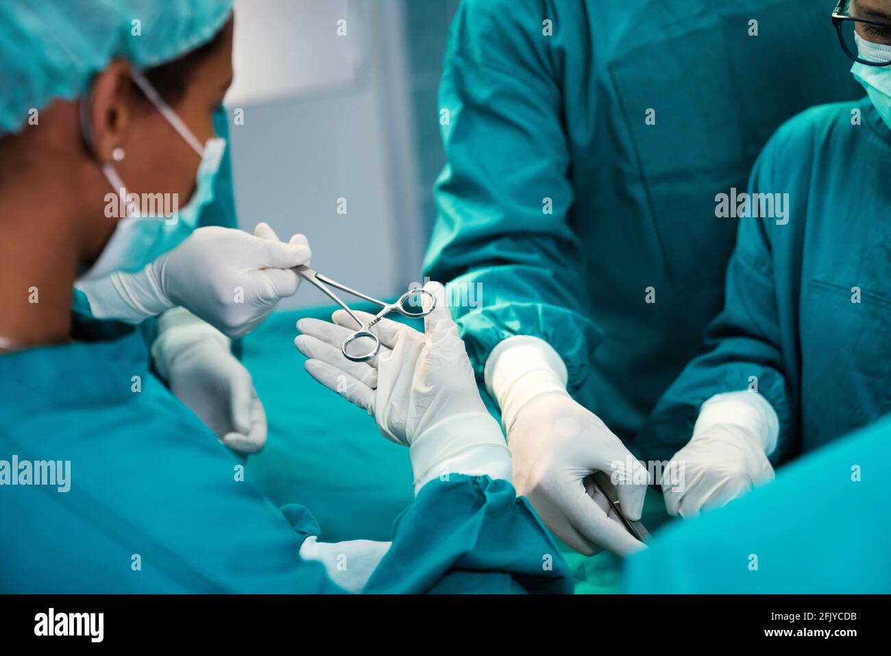 Group of surgeon team at work in operating room in hospital Stock Photo ...