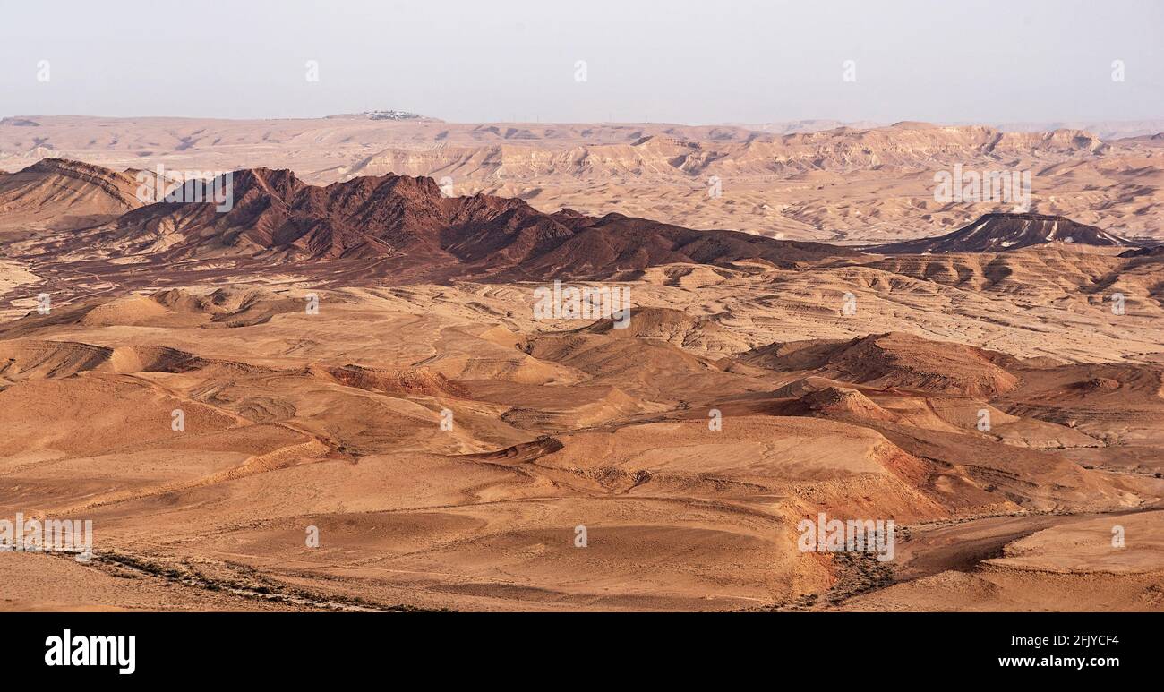 telephoto view of Ramon's Tooth aka Shen Ramon on the South Rim of the Maktesh Ramon erosion crater in Israel showing topographic details Stock Photo