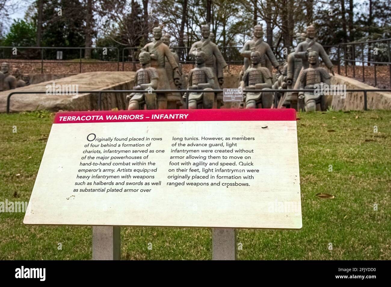 Troy, Alabama, USA-March 20, 2021: Informational sign in the foreground with terracotta warriors out of focus in the background at the Janice Hawkins Stock Photo