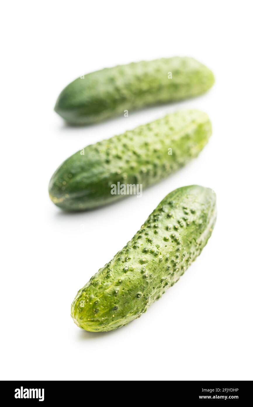 Fresh green cucumbers isolated on white background. Stock Photo