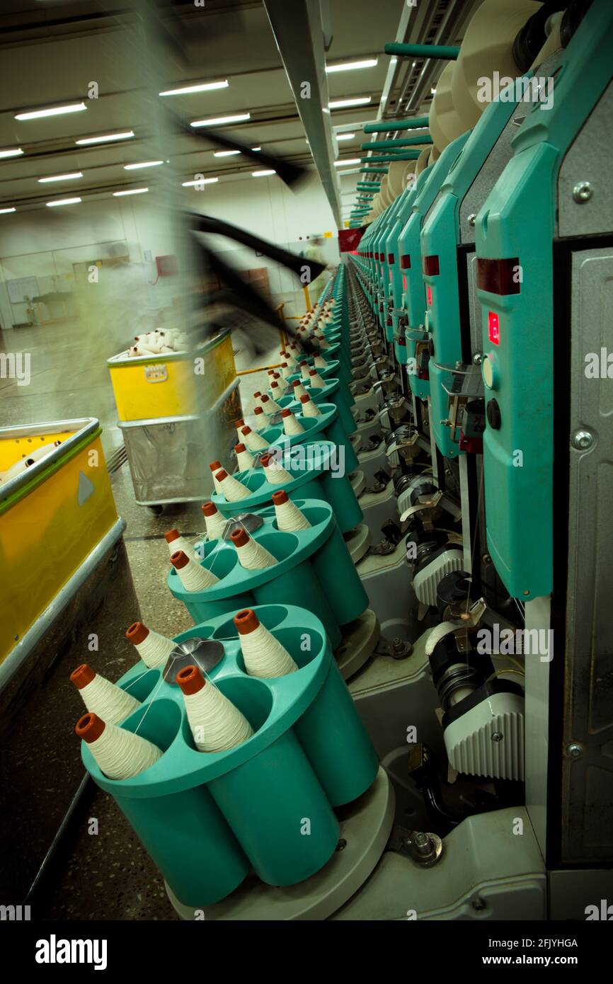 Auto Coner in Textile Spinning unit Stock Photo Alamy