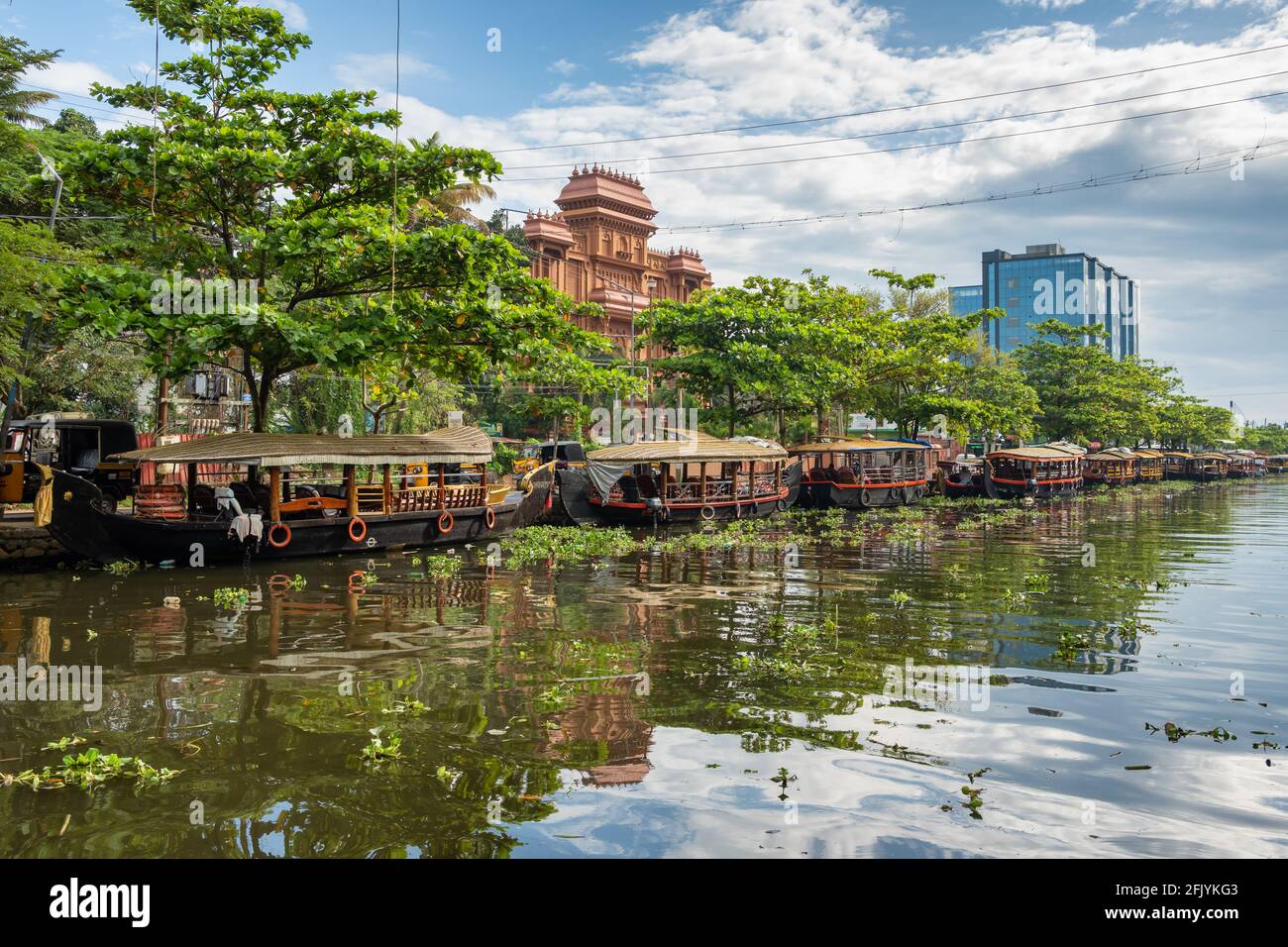 Traditional passenger boats parked at the backwaters in Alleppey, Kerala, India Stock Photo