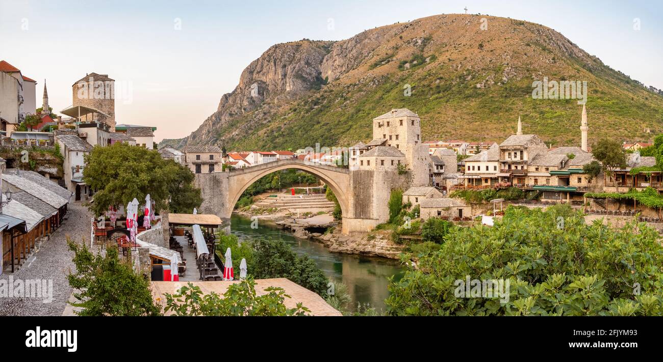 Mostar Old Town View With Stari Most Bridge At Sunset BiH Stock Photo mostar-old-town-view-with-stari-most-bridge-at-sunset-bih-stock-photo