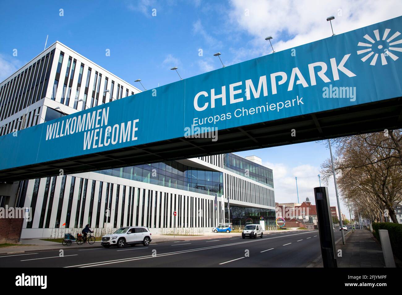 pipeline bridge of the Chempark over the federal road B8 and the headquarters of the Covestro AG, Leverkusen, North Rhine-Westphalia, Germany,  Rohrle Stock Photo