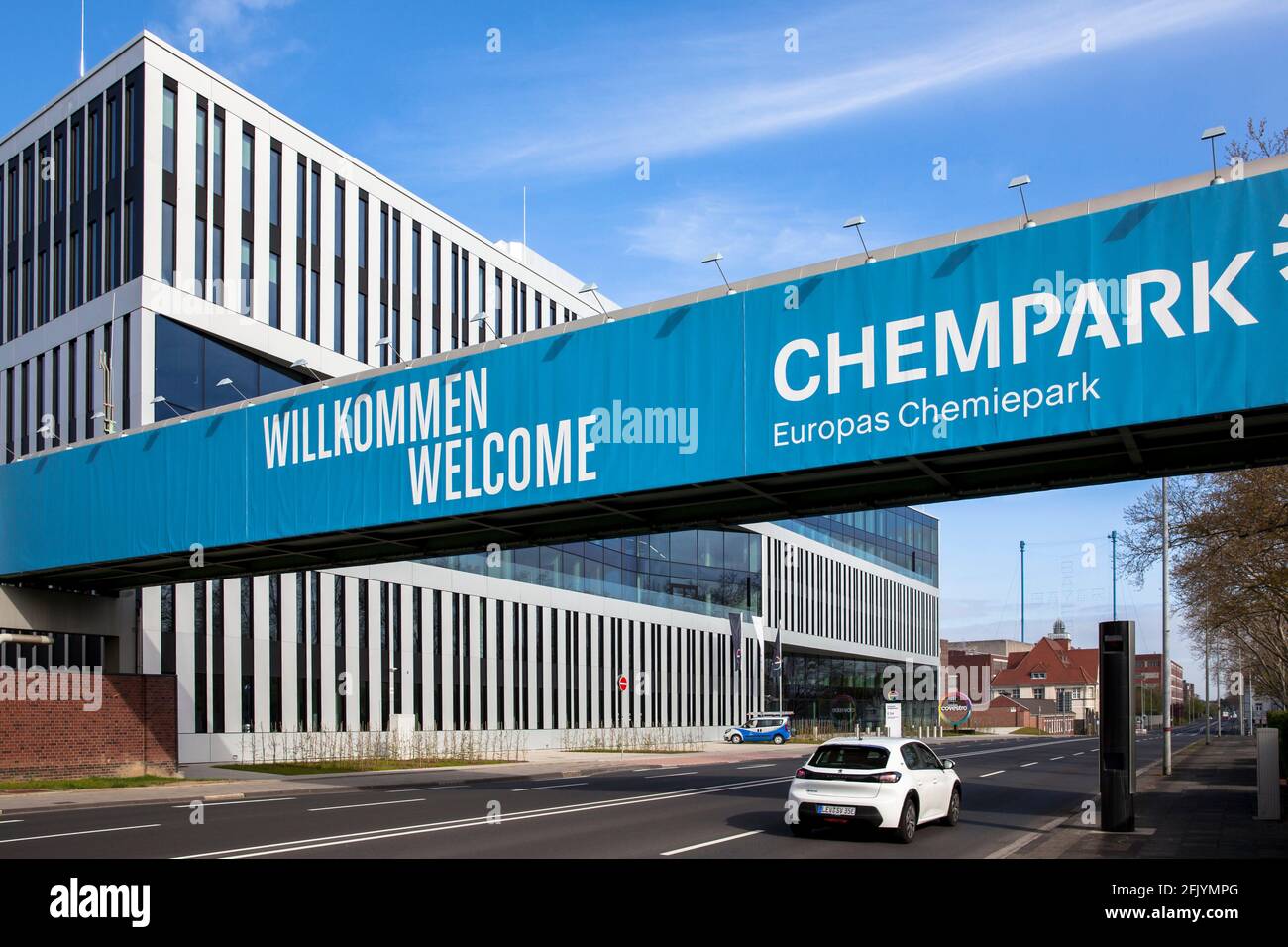 pipeline bridge of the Chempark over the federal road B8 and the headquarters of the Covestro AG, Leverkusen, North Rhine-Westphalia, Germany,  Rohrle Stock Photo