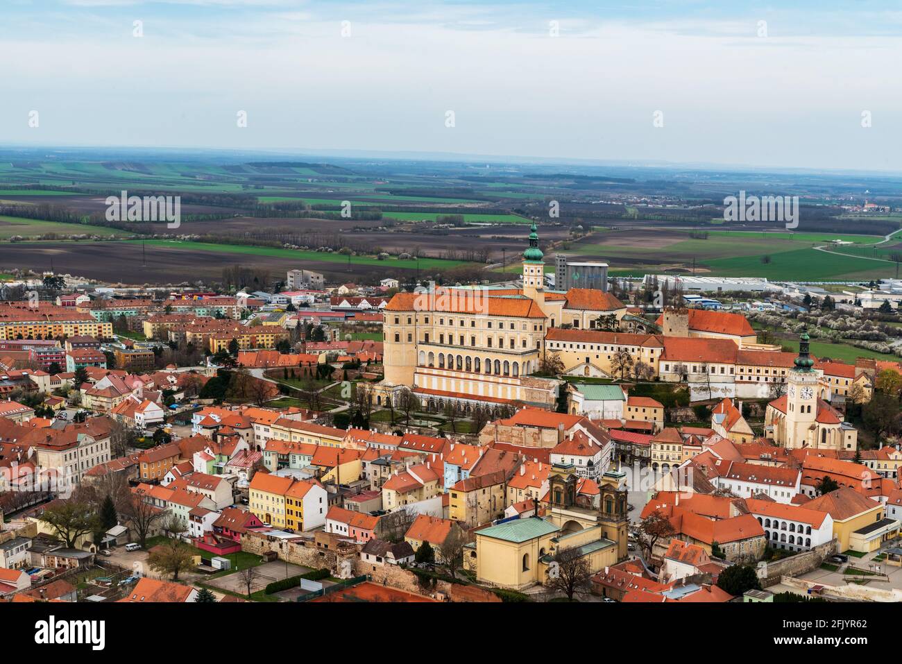 Beautiful Mikulov town with chateau and rural landscape on czech - austrian borderland from Svaty kopecek hill in Palava mountains in Czech republic Stock Photo