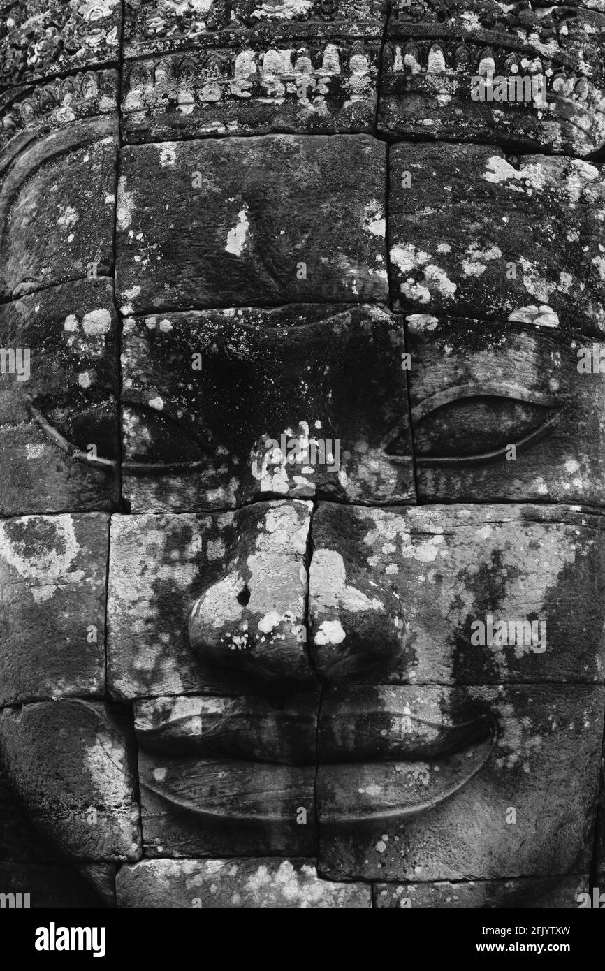 Stone Faces At The Bayon Temple, Angkor Wat Temple Complex, Siem Reap, Cambodia. Stock Photo