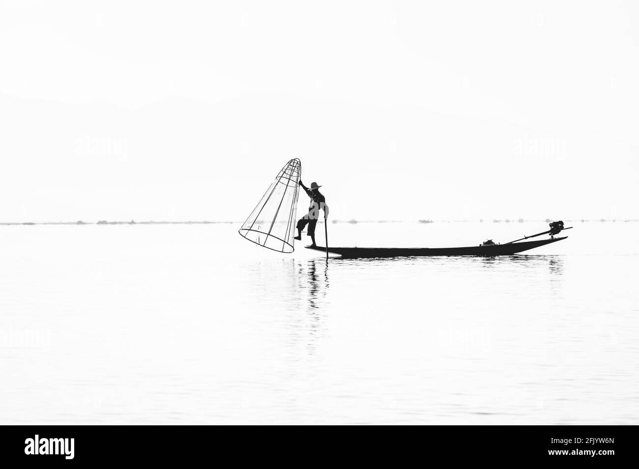 A Fisherman On Lake Inle, Shan State, Myanmar. Stock Photo